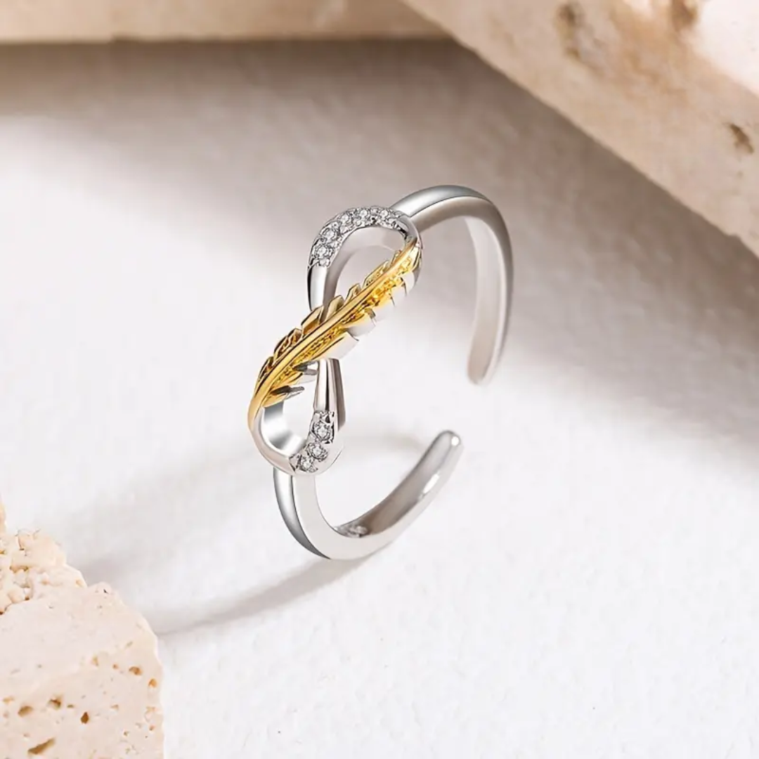 Infinity Feather Ring | Støtt brystkreft