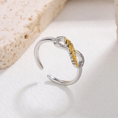 Infinity Feather Ring | Støtt brystkreft