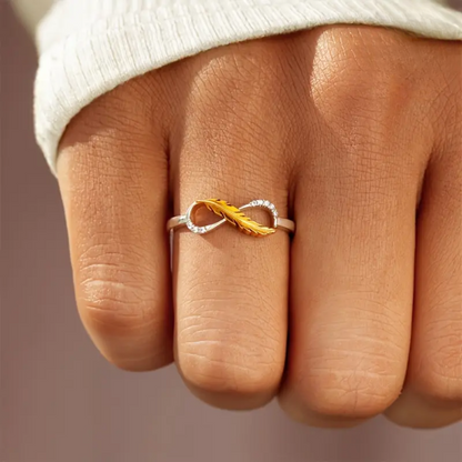 Infinity Feather Ring | Støtt brystkreft