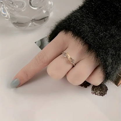 Infinity Feather Ring | Støtt brystkreft