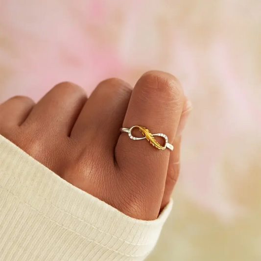 Infinity Feather Ring | Støtt brystkreft